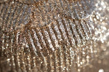 Arka plan olarak güzel bej bir Noel balosunun yakın çekimi. Seçici odak, bulanık fotoğraf. 