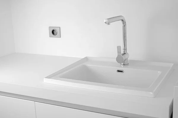 Modern bathroom interior with sink and chrome faucet. — 图库照片