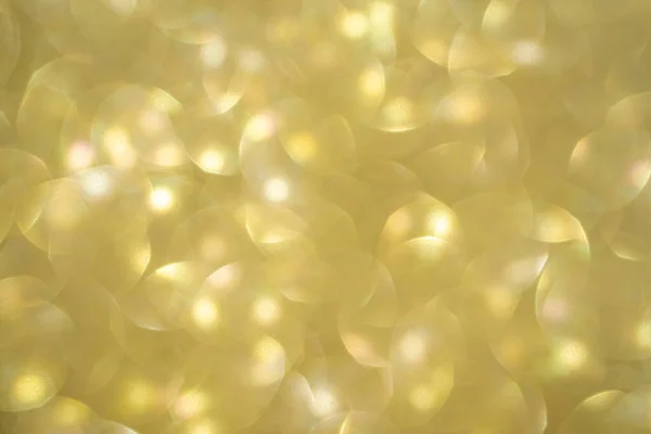 Brilho dourado vintage luzes fundo. Desfocado. Close-up — Fotografia de Stock