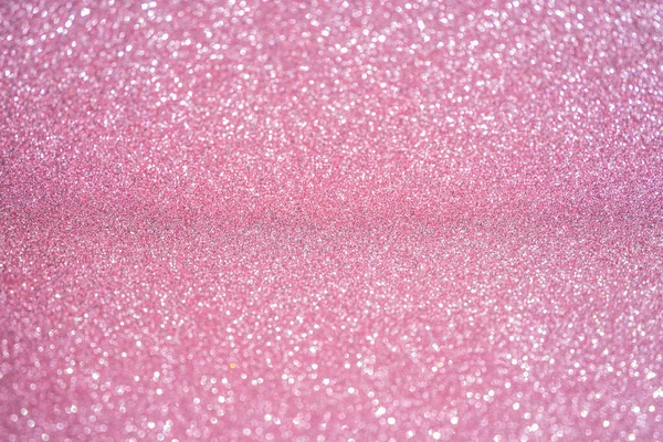 Rose pink glitter vintage lights background. Selective focus. Close-up