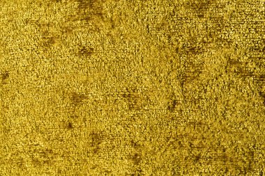 Yumuşak pamuklu kumaş halı dikişsiz doku arka planı. Altın sarısı renk