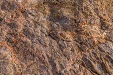 Doğanın taş desenli fotoğrafı. Kaya arka planı. Dağ yakın çekim. Dağ dokusu.