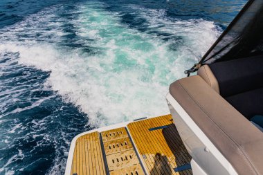 Luxury motor yacht in the azure Mediterranean sea at full speed.Expensive yacht. 