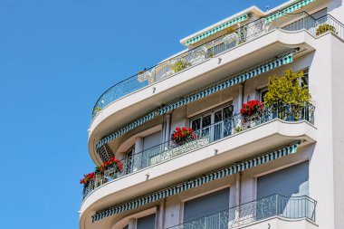 Traditional French old building with typical balconies and windows. Nice, France. High quality photo
