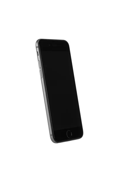 Telefono nero in prospettiva su sfondo bianco — Foto Stock