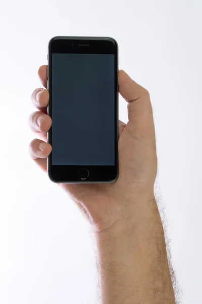 Black iPhone in hand