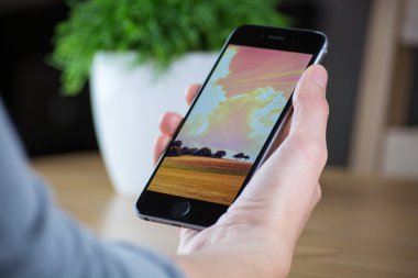 iPhone 6 tutun el