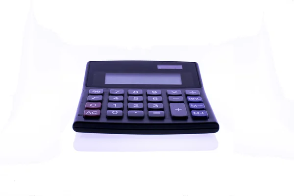 Black calculator on white background — Stock Photo, Image