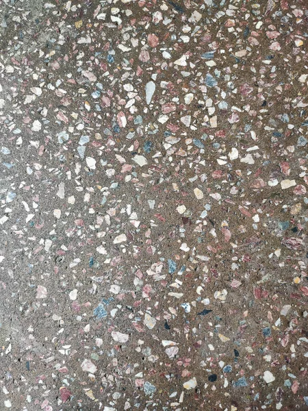 Su sıçraması ve grunge arkaplanı olan renkli beton zemin — Stok fotoğraf