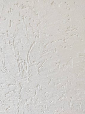 metin için yeri olan bej desenli dekoratif sıva arkaplanı