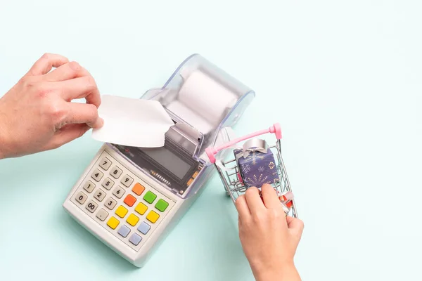 Close Woman Hand Tearing Check Cash Register Next Cart Wrapped — Stock Photo, Image