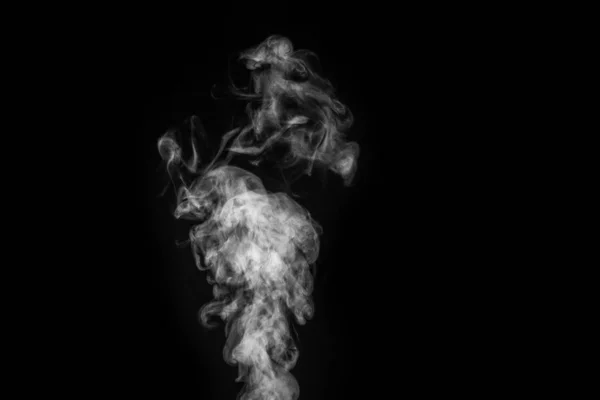 Perfect mystical curly white steam or smoke isolated on black background. Abstract background fog or smog — Stock Photo, Image