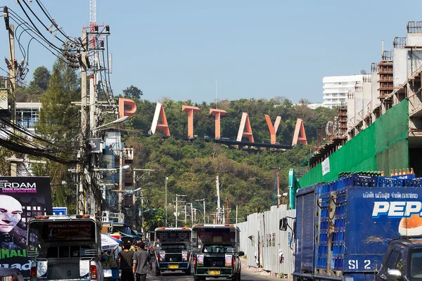 The street of Pattaya Walking street with advertising signs in Thailand in the afternoon