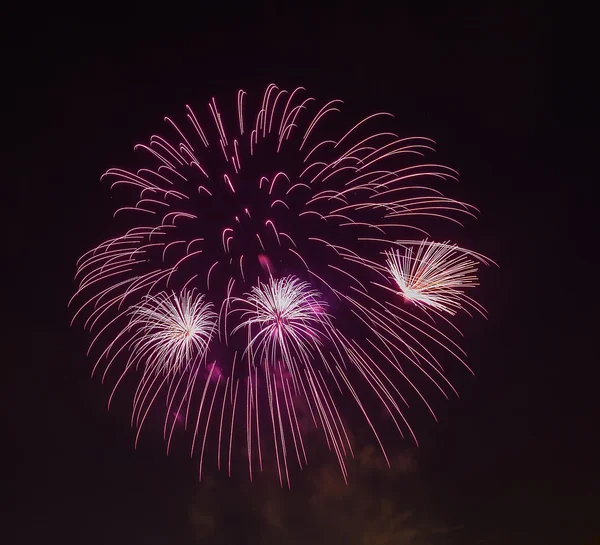 The evening fireworks in the sky in honor of celebration of Victory Day — Stock Photo, Image