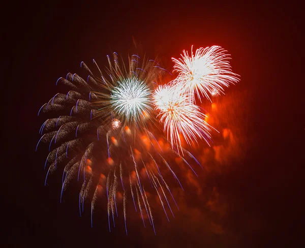 The evening fireworks in the sky in honor of celebration of Victory Day — Stock Photo, Image