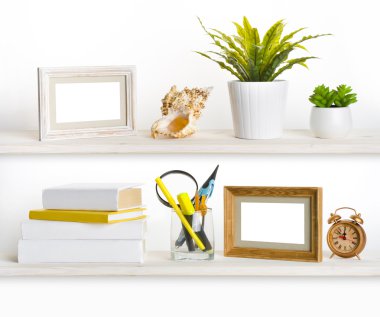 Wooden shelves with different office related objects