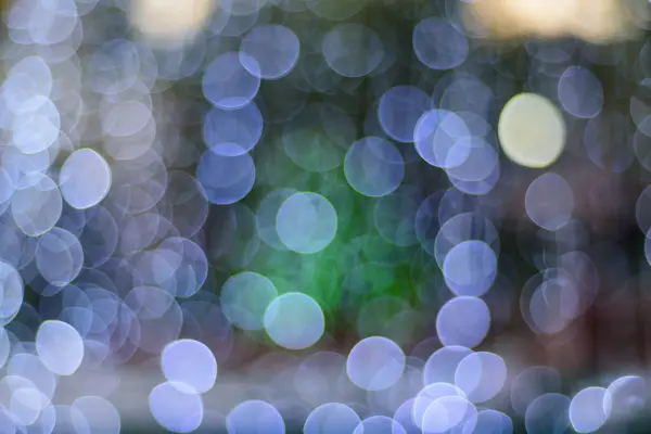 Vícebarevné bokeh kruhy pro vánoční pozadí pozadí — Stock fotografie