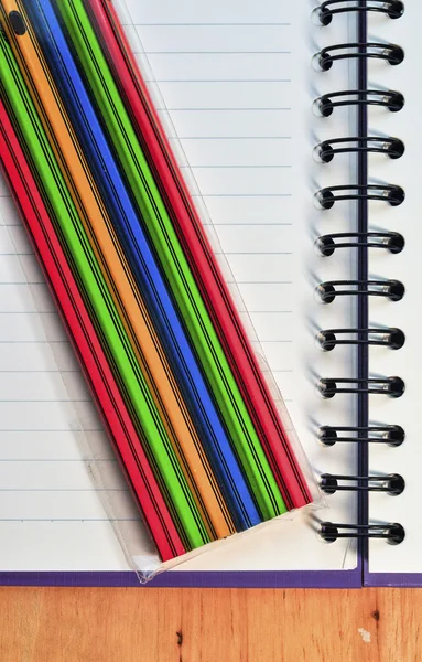 Pencils with notebook — Stock Photo, Image