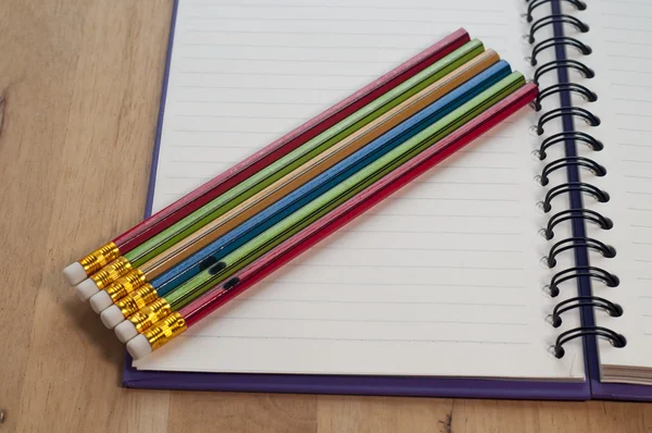 Pencils with notebook — Stock Photo, Image