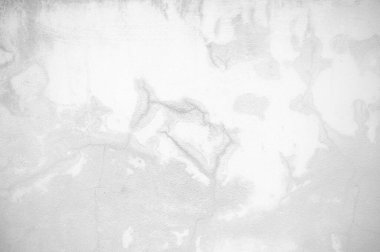 Siyah ve beyaz alçılı tuğla duvar kavramı. Arka planda çatlaklar, desenler ve arka planda dokular. Beton yüzeyler biraz pürüzlüdür. Rastgele, dikişsiz duvar deseni