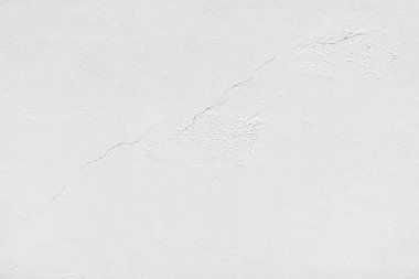 Siyah ve beyaz alçılı tuğla duvar kavramı. Arka planda çatlaklar, desenler ve arka planda dokular. Beton yüzeyler biraz pürüzlüdür. Rastgele, dikişsiz duvar deseni