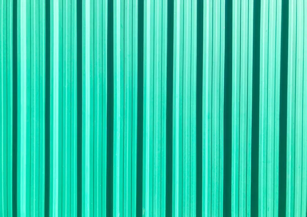 Zinc surface texture green galvanized iron wall texture, Zinc with rust pattern background Closeup pattern texture vertical zinc sheet Zinc view, Wall aluminum Green is stainless for the background.