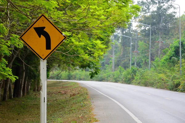 turn left warning sign