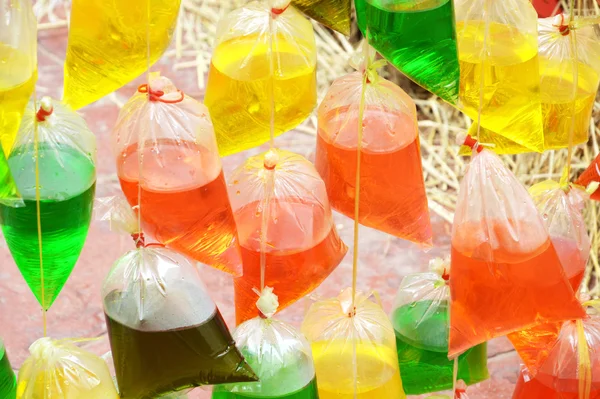 Agua colorida en bolsa de plástico —  Fotos de Stock