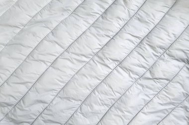 Aşağı ceket kumaş arka plan, gri kabarık ceket dokusu