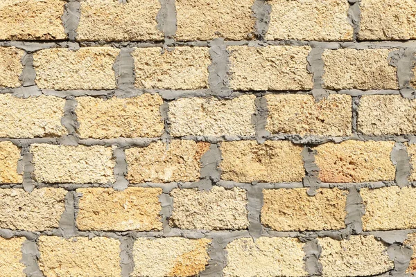 시멘트로 석회석 벽돌이다 자연스럽고 텍스처 앞모습 — 스톡 사진
