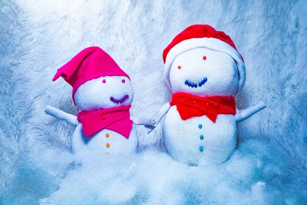 Snowman dolls made from socks to celebrate Christmas. Fun activity with kids at home. Recycling used socks. — Stock Image Snowman Dolls Made Socks Celebrate Christmas Fun Activity Kids Home Stock Photo