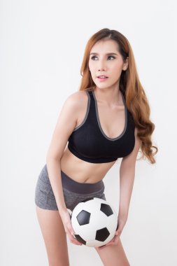 Futbol topu olan seksi kadın