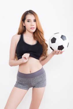 Futbol topu olan seksi kadın
