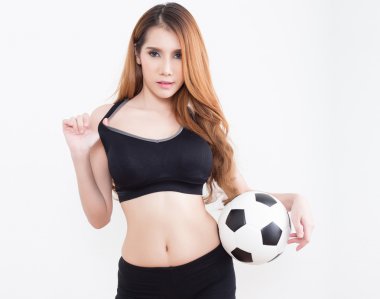 Futbol topu olan seksi kadın