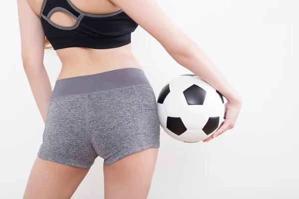 Cuerpo de mujer sexy con pelota de fútbol — Foto de Stock