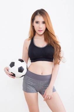 Futbol topu olan seksi kadın