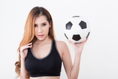 Futbol topu olan seksi kadın