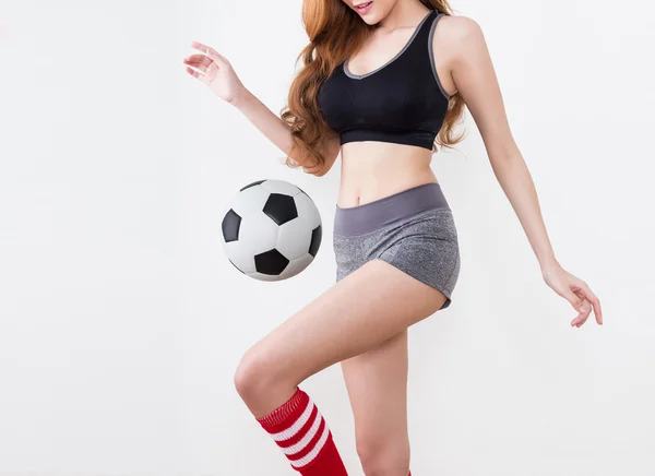 Sexy corpo de mulher com bola de futebol — Fotografia de Stock