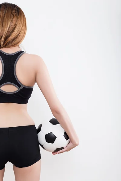 Junge sexy Frau mit Fußball — Stockfoto