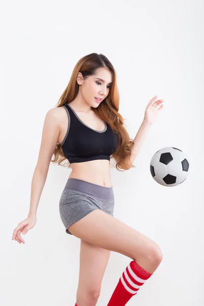 Jovem mulher sexy com bola de futebol — Fotografia de Stock