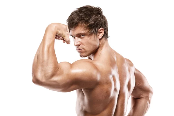 Strong atletický muž Fitness Model představuje zádové svaly, triceps, — Stock fotografie