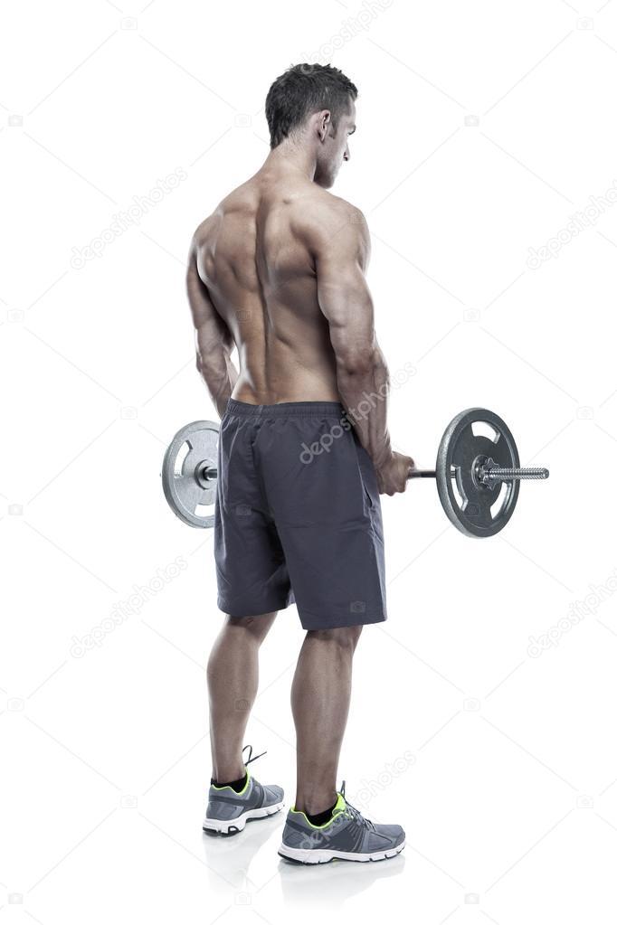 Muscular bodybuilder guy doing exercises with big dumbbell over 