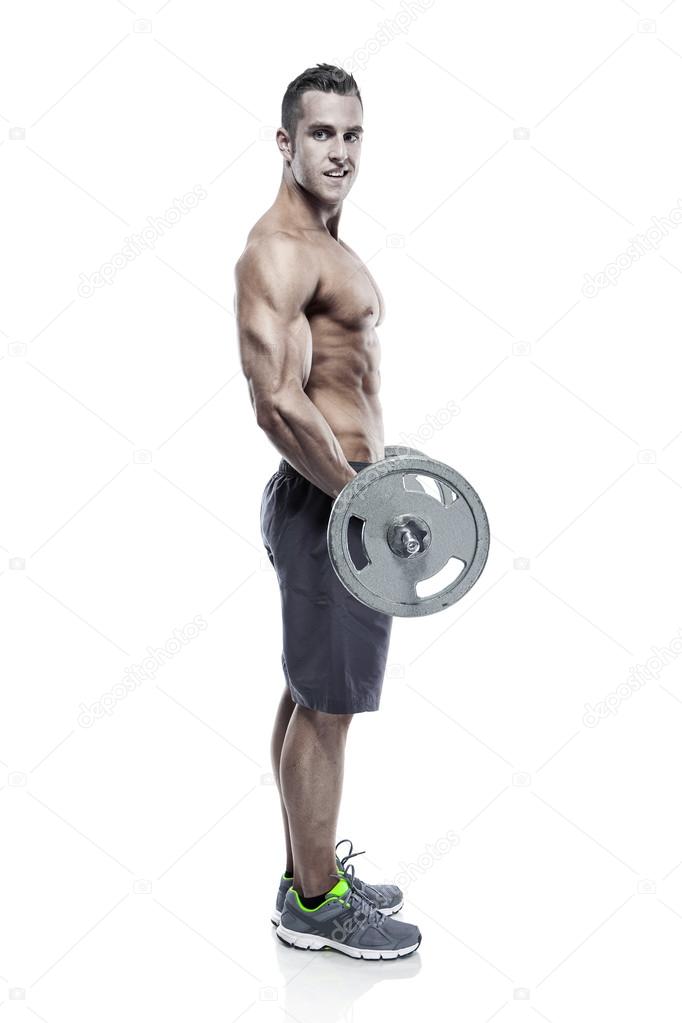 Muscular bodybuilder guy doing exercises with big dumbbell over 