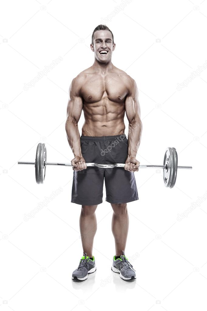 Bodybuilder guy doing exercises with dumbbells