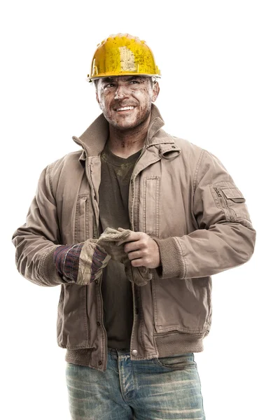 Hombre trabajador sucio con casco de sombrero duro — Foto de Stock