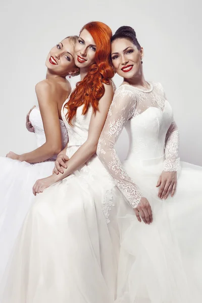 Three beautiful woman in wedding dress — Stock Photo, Image