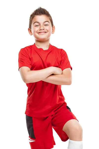 Staande jonge voetballer in sportkleding — Stockfoto