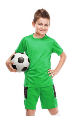 standing young soccer player holding football clipart