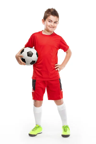 Standing young soccer player holding football — Stock Photo, Image