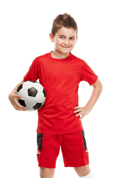 Standing young soccer player holding football — Stock Photo, Image